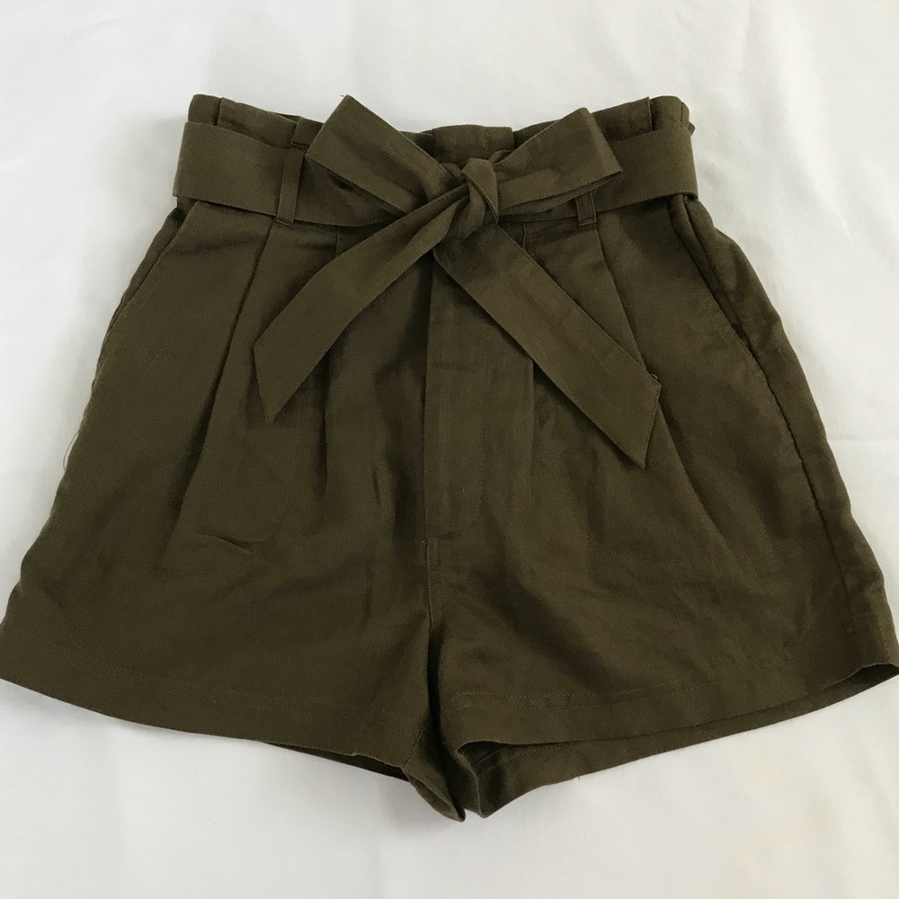 Army green high waisted shorts.